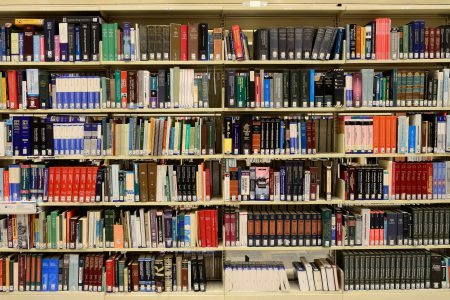 Row of books in library.