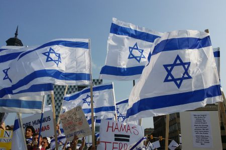 Israeli flags at protest.