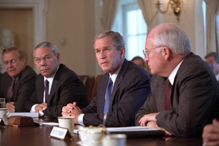 President George Bush 2 sat at cabinet meeting.